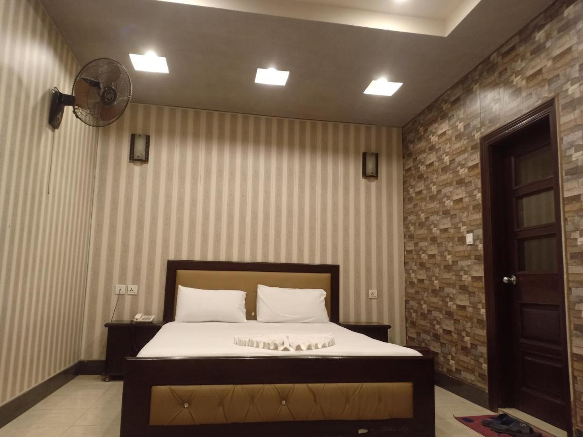 Hotel New Madina Faisalabad Esterno foto